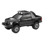 Black monster truck Bluetooth speaker with LED light, WSTER WS-589 portable wireless audio desk setup accessory.