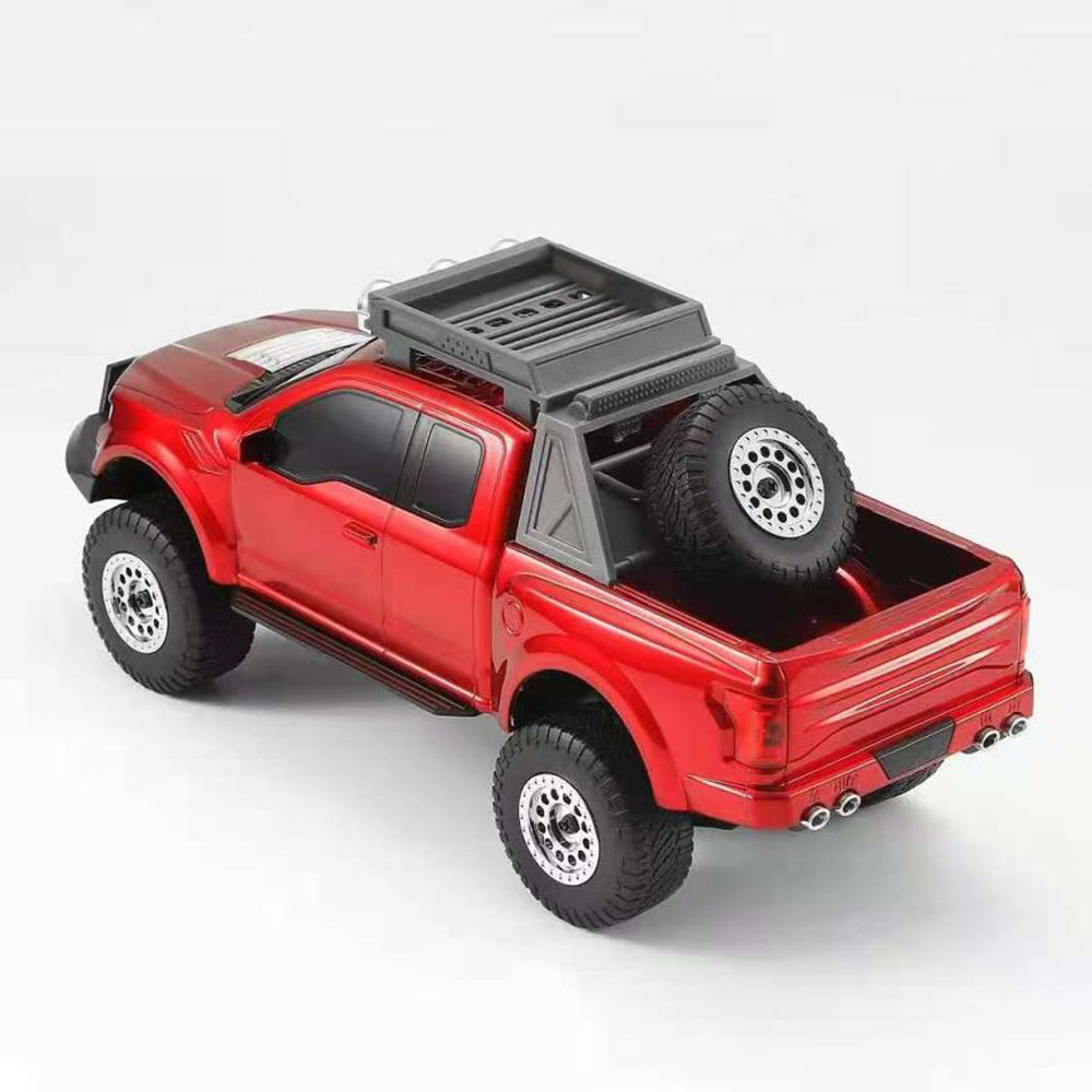 Red monster truck Bluetooth speaker with LED lights, WSTER WS-589, portable wireless audio desk decor.