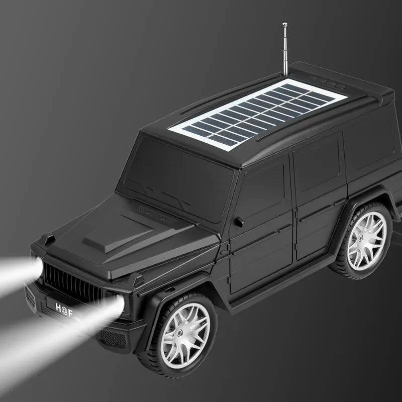 Black luxury SUV Jeep Bluetooth speaker with solar charging and carry strap, H@F HF-F88 portable desk decor.