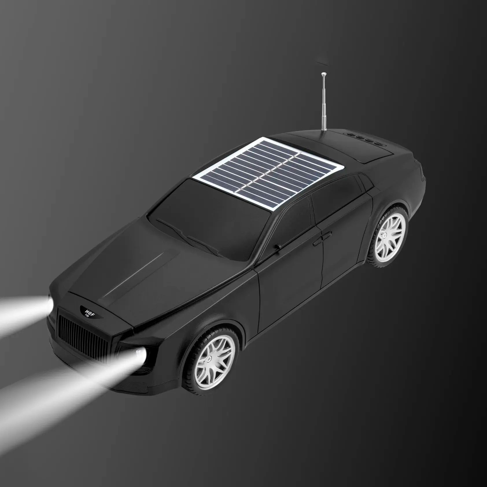 Black luxury car design solar Bluetooth speaker H@F F98, portable wireless audio desk setup accessory.