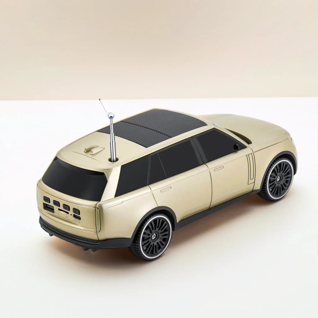 H@F F-119 SUV-style Bluetooth speaker with solar charging, FM radio, super bass stereo, desk setup accessory.