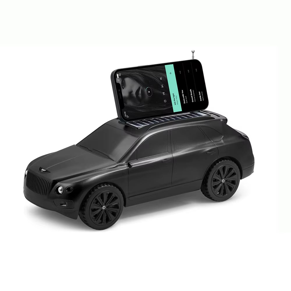 Black luxury car replica Bluetooth speaker with solar panel charging, H@F F-68, robust stereo bass desk decor.