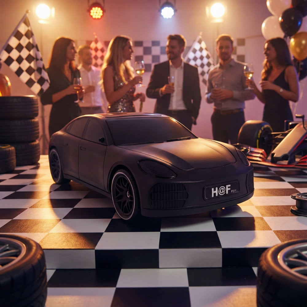 H@F F-911 solar-powered car model Bluetooth speaker with FM radio, super bass stereo, desk setup accessory.