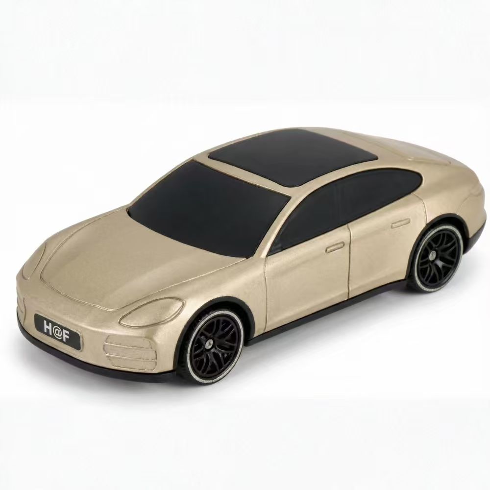 Gold F-911 solar-powered car model Bluetooth speaker with FM radio, H@F F-911, super bass desk setup accessory.