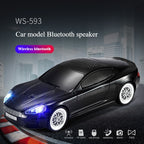 Compact modern car-style Bluetooth speaker with LED lights, WSTER WS-593, portable desk setup accessory.