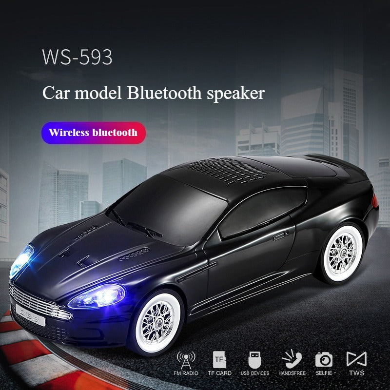 Compact modern car-style Bluetooth speaker with LED lights, WSTER WS-593, portable desk setup accessory.