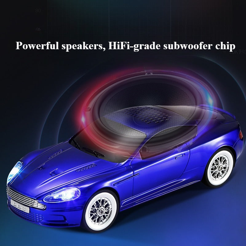 Compact modern car-style Bluetooth speaker with LED lights, WSTER WS-593, portable desk setup accessory.