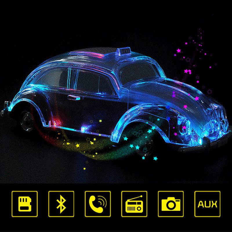 Green Beetle-style taxi car Bluetooth speaker, WSTER WS-1937, retro desk setup accessory and gift.