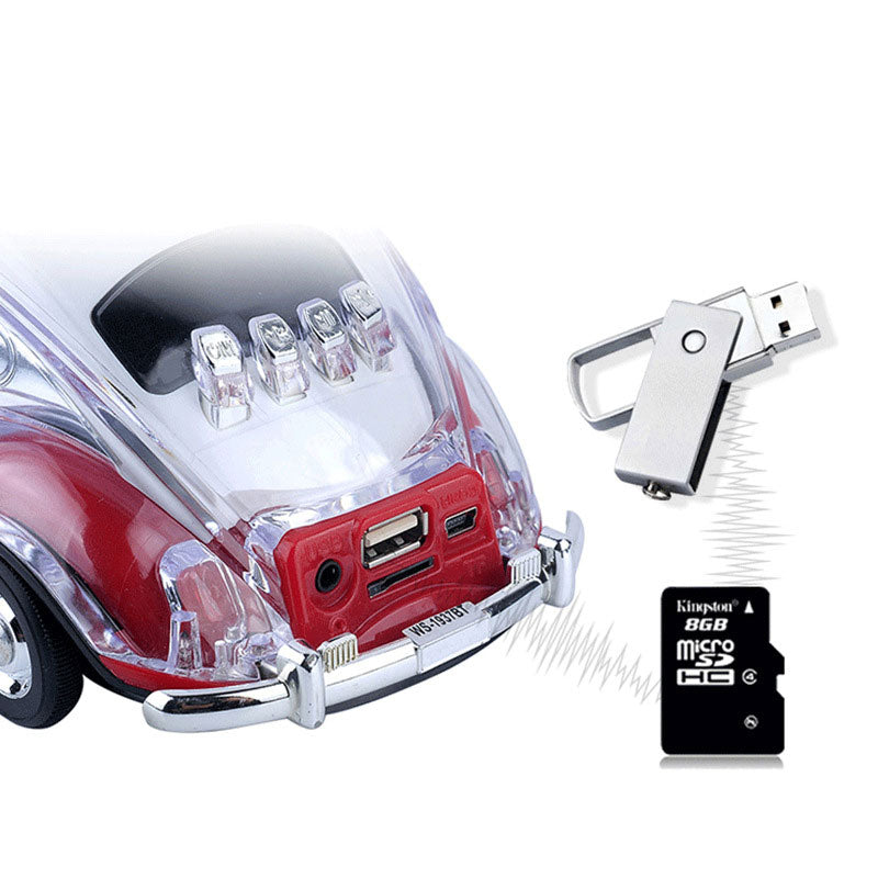 Green Beetle-style taxi car Bluetooth speaker, WSTER WS-1937, classic car replica desk setup accessory.