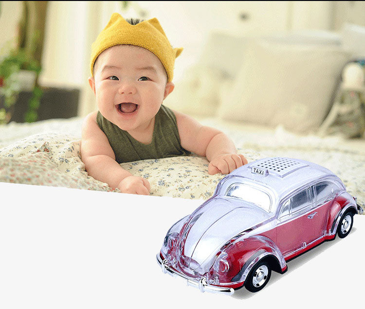 Green Beetle-style taxi car Bluetooth speaker, WSTER WS-1937, crystal clear portable wireless audio desk decor.