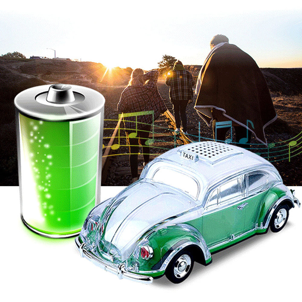Green Beetle-style taxi car Bluetooth speaker, WSTER WS-1937, classic car replica desk setup accessory.