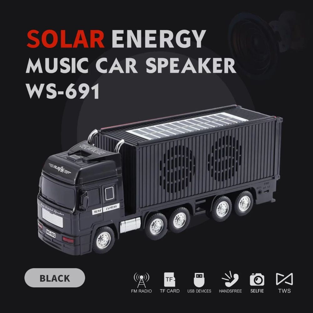 Black semi truck Bluetooth speaker, WSTER WS-691, solar-powered portable wireless audio for desk setup decor.