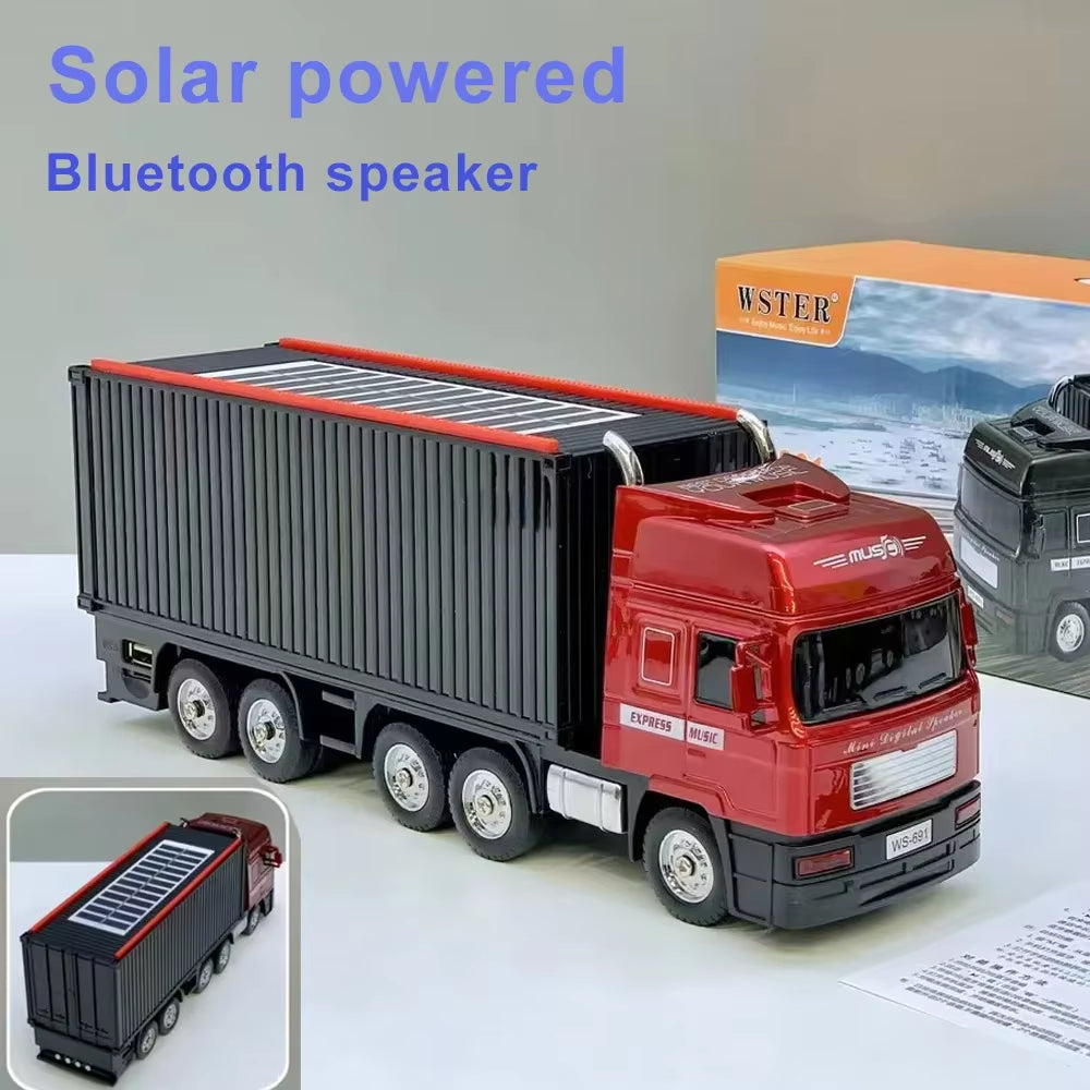 Red semi truck Bluetooth speaker, WSTER WS-691, solar-powered portable wireless audio for desk setup decor.