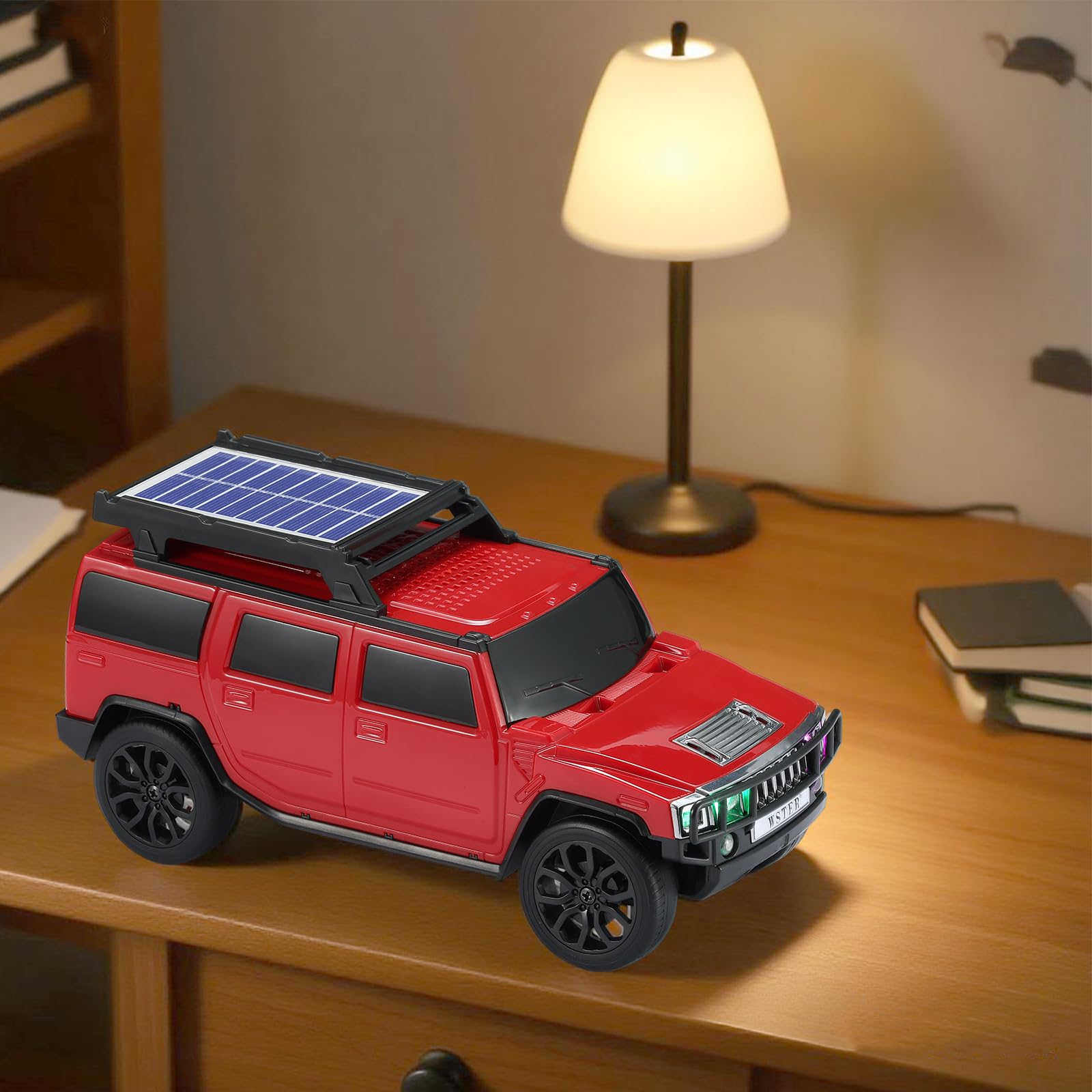 Boxy SUV-inspired Bluetooth speaker with solar charging, LED lights and moving wheels, WSTER WS-696.