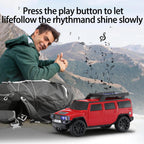 Boxy SUV Bluetooth speaker with solar charging, LED lights and FM radio, WSTER WS-696 desk setup accessory.