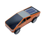 Orange cybercar Bluetooth speaker with solar charging and LED lights, WSTER WS-699, desk setup accessory.