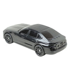 Black X-703 sport car Bluetooth speaker, solar powered portable wireless audio for desk setup and car guy gift.